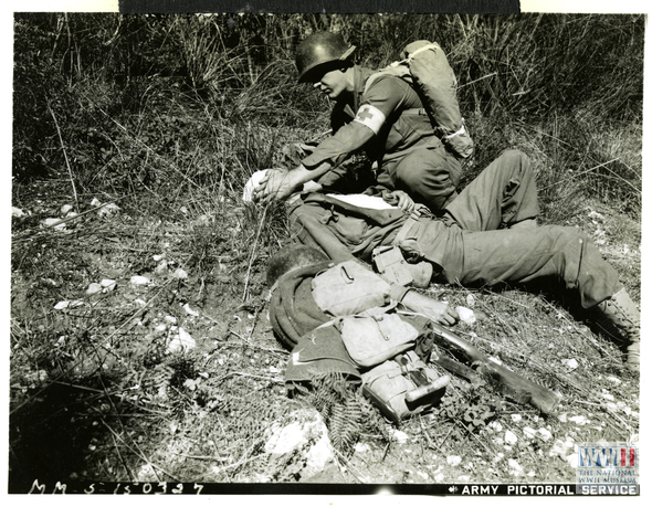 medical-personnel-assisting-wounded-american-soldier-in-italy-on-10