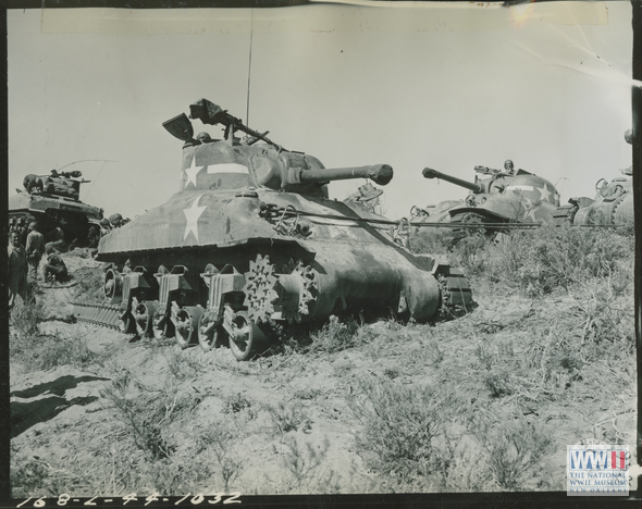 Repairing A Damaged M4 Sherman Tank In The Field During Training